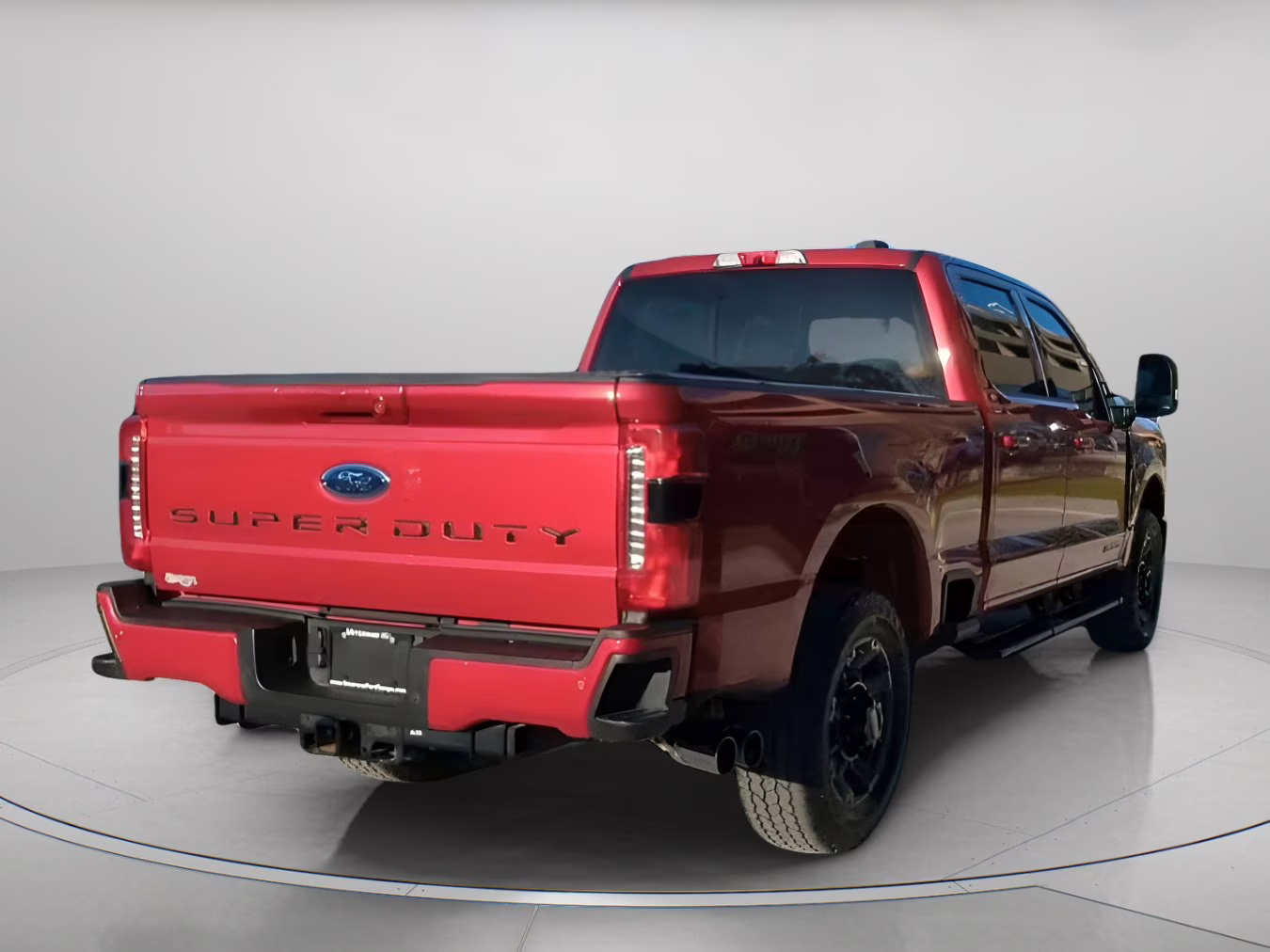 2024 Rapid Red Metallic Tinted Clearcoat Ford Super Duty F-250 SRW LARIAT Crew Cab Pickup 4X4 Truck