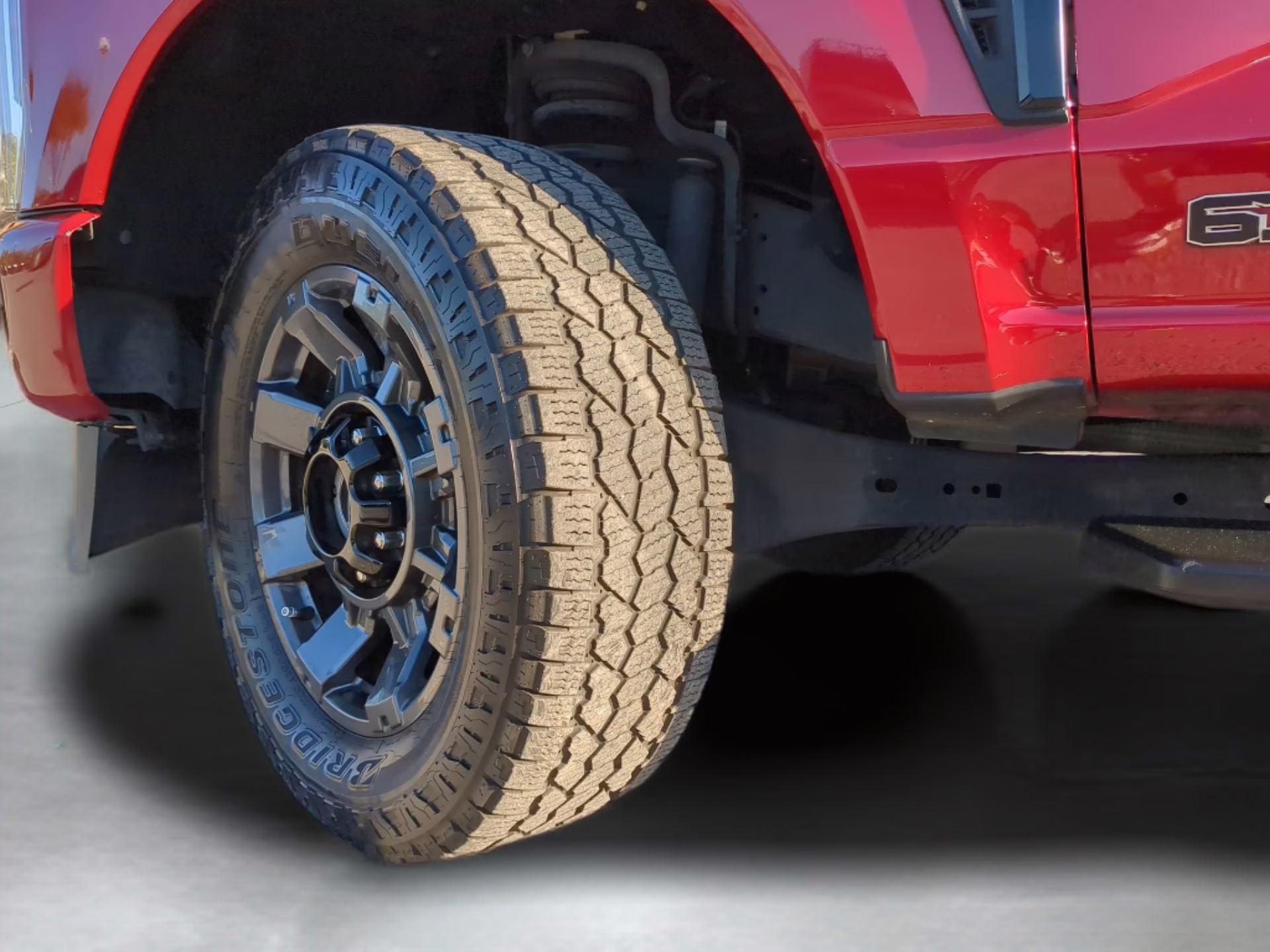 2024 Rapid Red Metallic Tinted Clearcoat Ford Super Duty F-250 SRW LARIAT Crew Cab Pickup 4X4 Truck