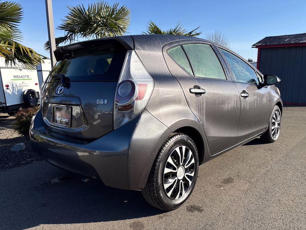 2014 Magnetic Gray Metallic Toyota Prius c Three FWD Hatchback