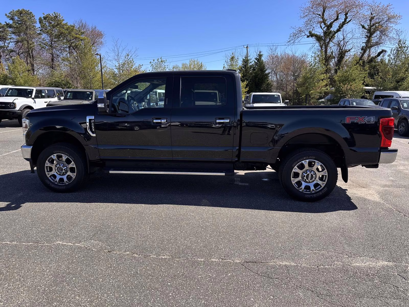 2021 Agate Black Metallic Ford Super Duty F-250 SRW LARIAT 4WD Crew Cab 6.75' Box 4X4 Truck