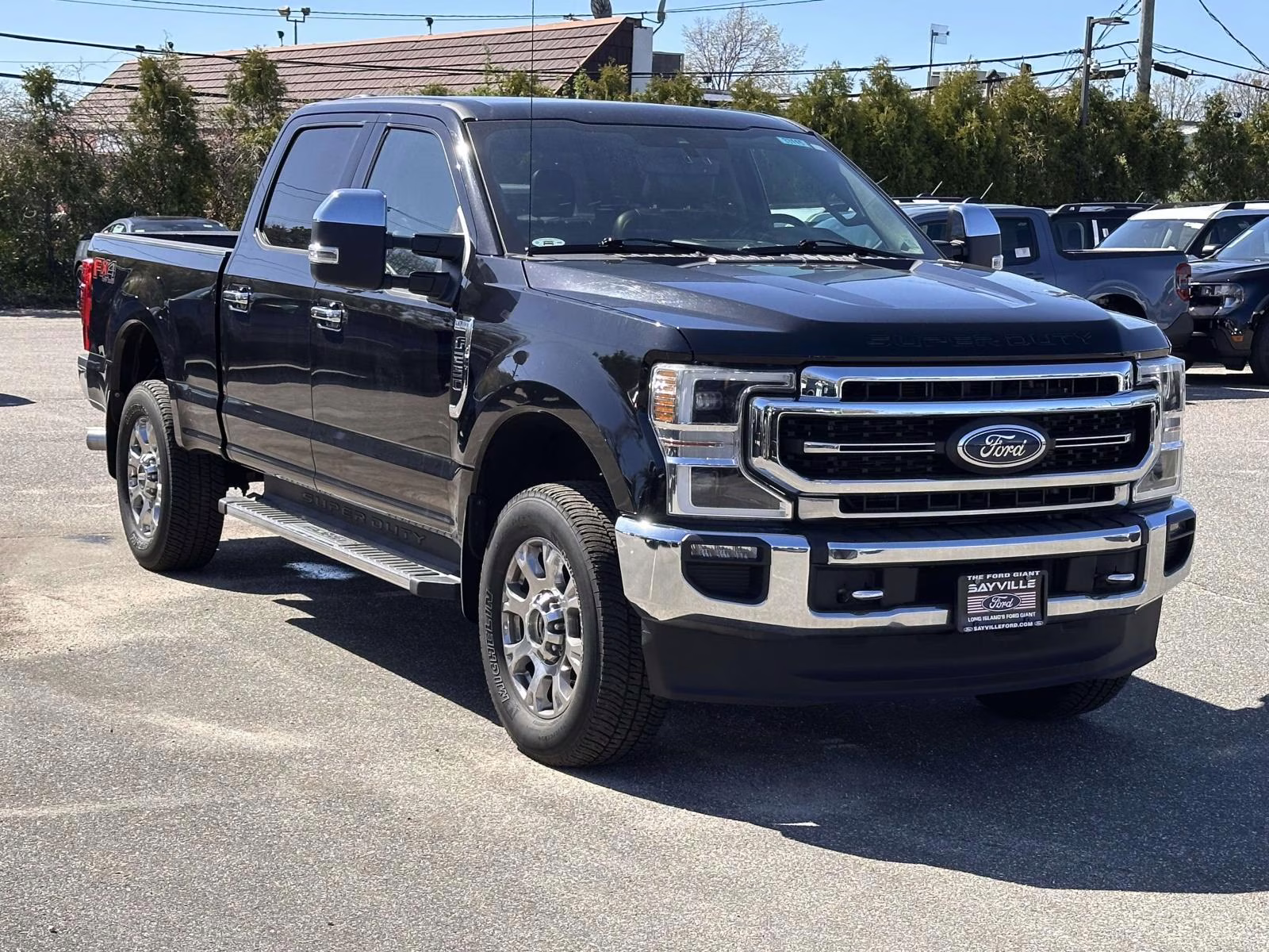 2021 Agate Black Metallic Ford Super Duty F-250 SRW LARIAT 4WD Crew Cab 6.75' Box 4X4 Truck