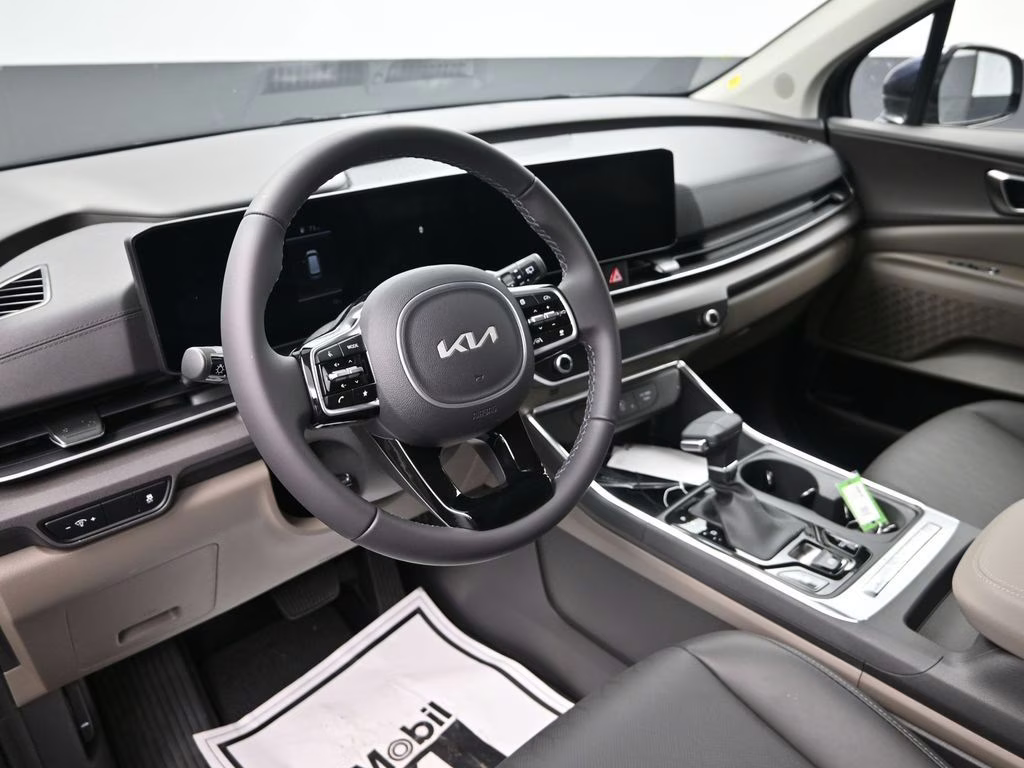 2026 Deep Chroma Blue Kia Carnival EX FWD Van