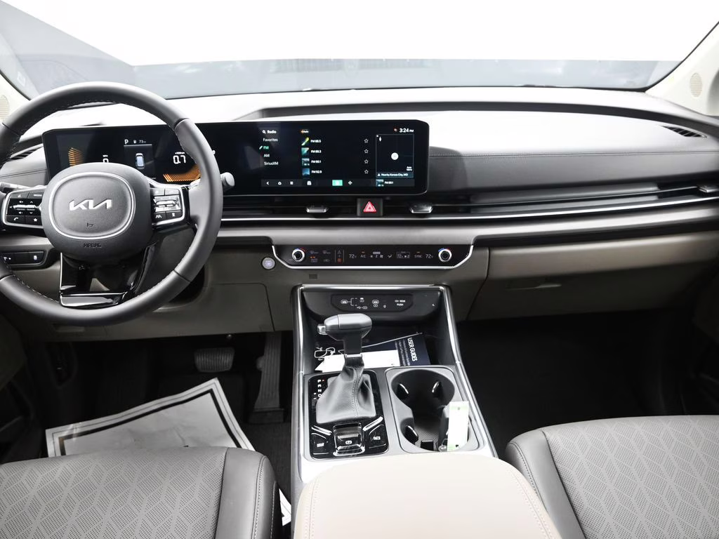 2026 Deep Chroma Blue Kia Carnival EX FWD Van