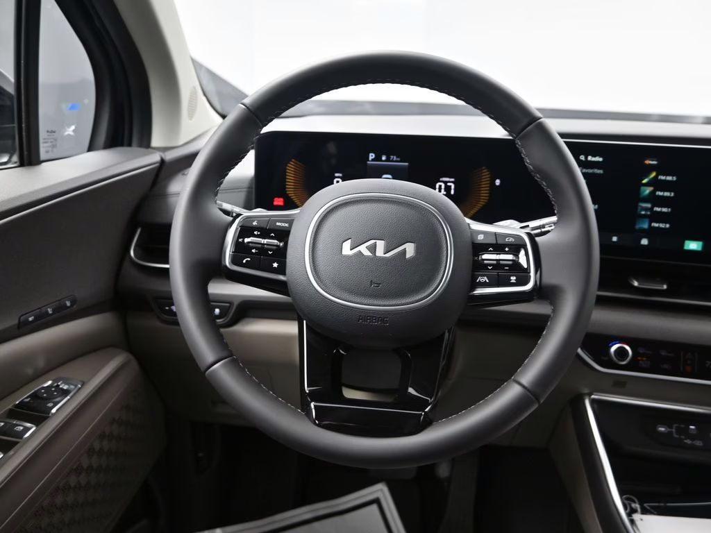 2026 Deep Chroma Blue Kia Carnival EX FWD Van