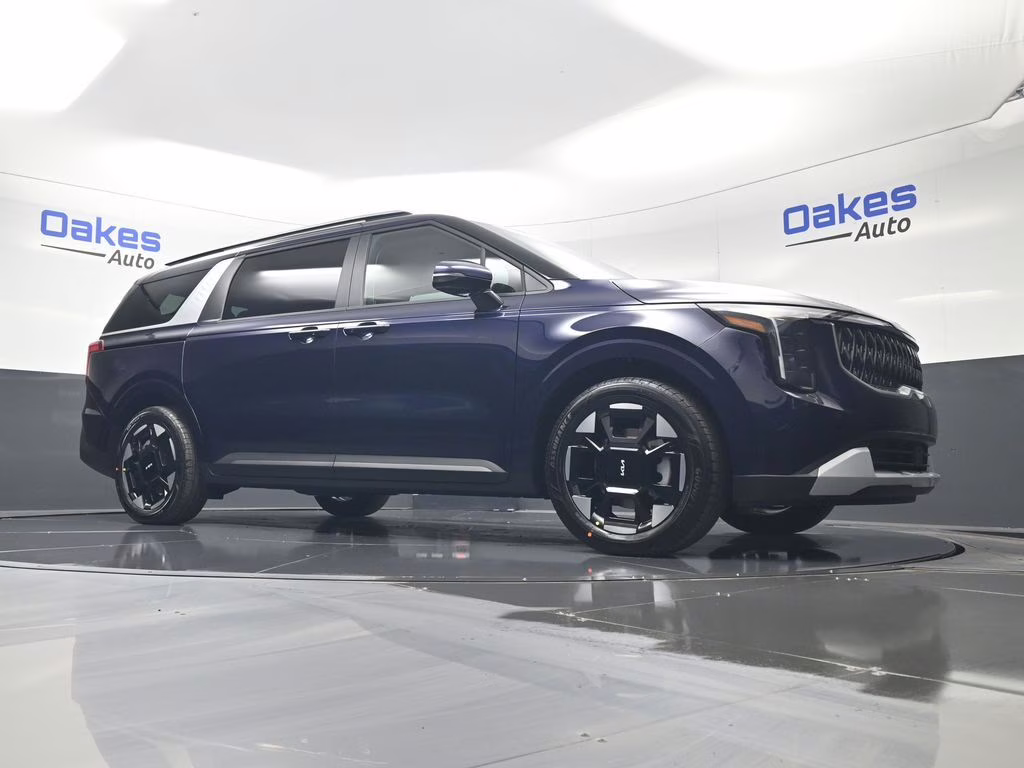 2026 Deep Chroma Blue Kia Carnival EX FWD Van