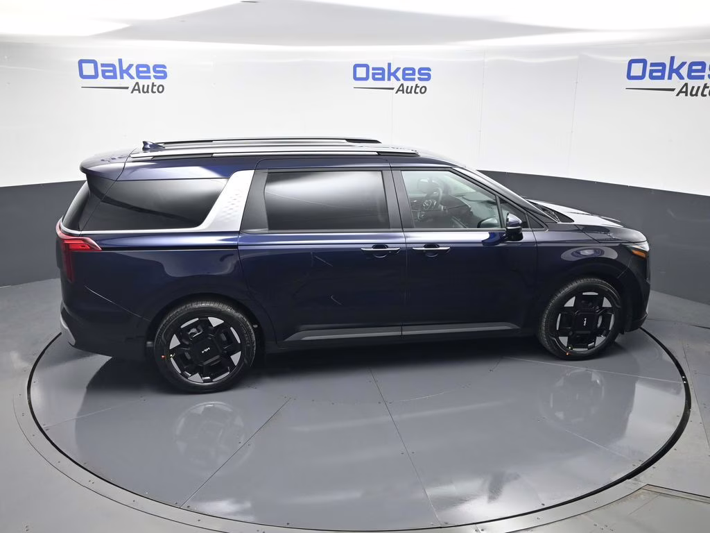 2026 Deep Chroma Blue Kia Carnival EX FWD Van