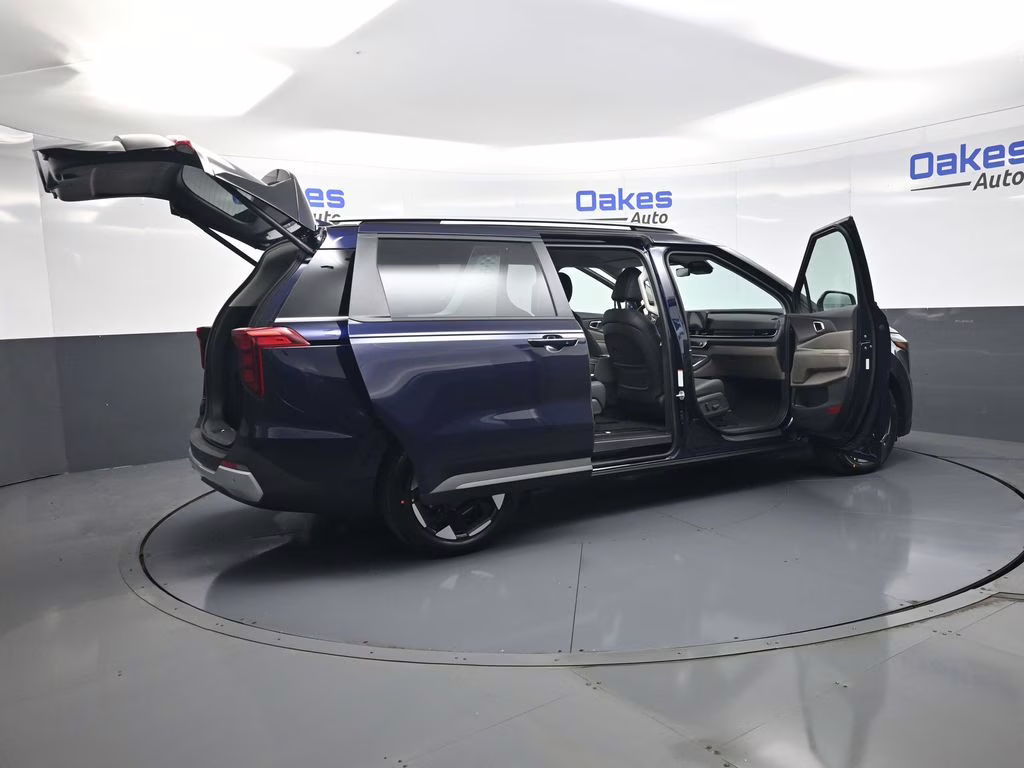 2026 Deep Chroma Blue Kia Carnival EX FWD Van