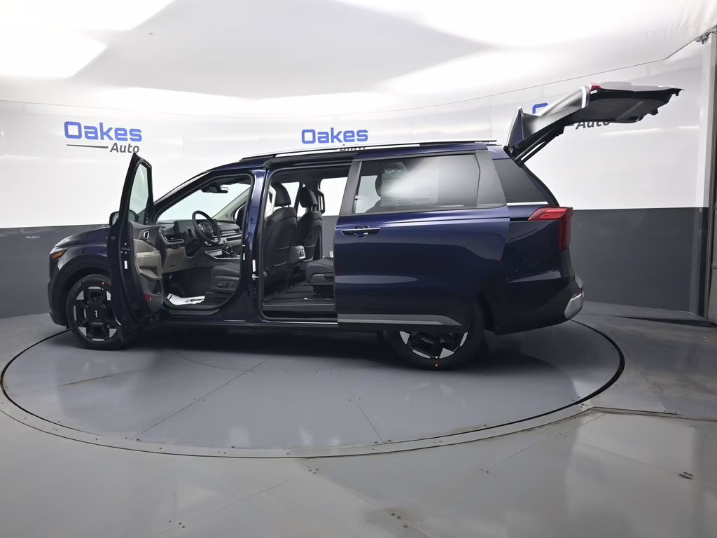 2026 Deep Chroma Blue Kia Carnival EX FWD Van
