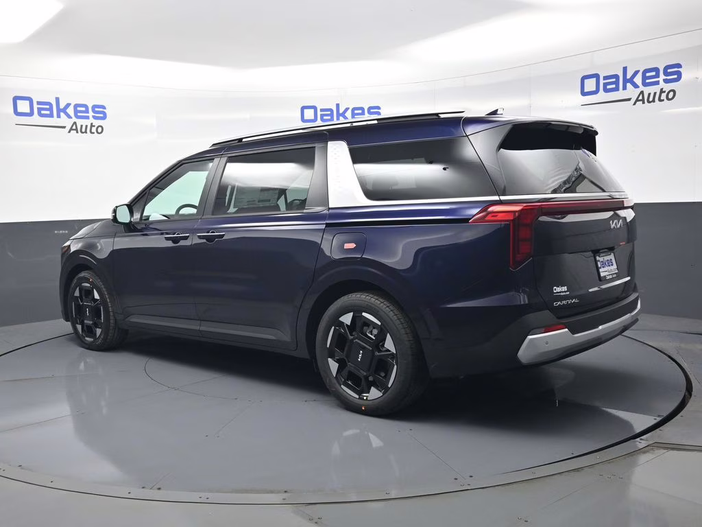 2026 Deep Chroma Blue Kia Carnival EX FWD Van