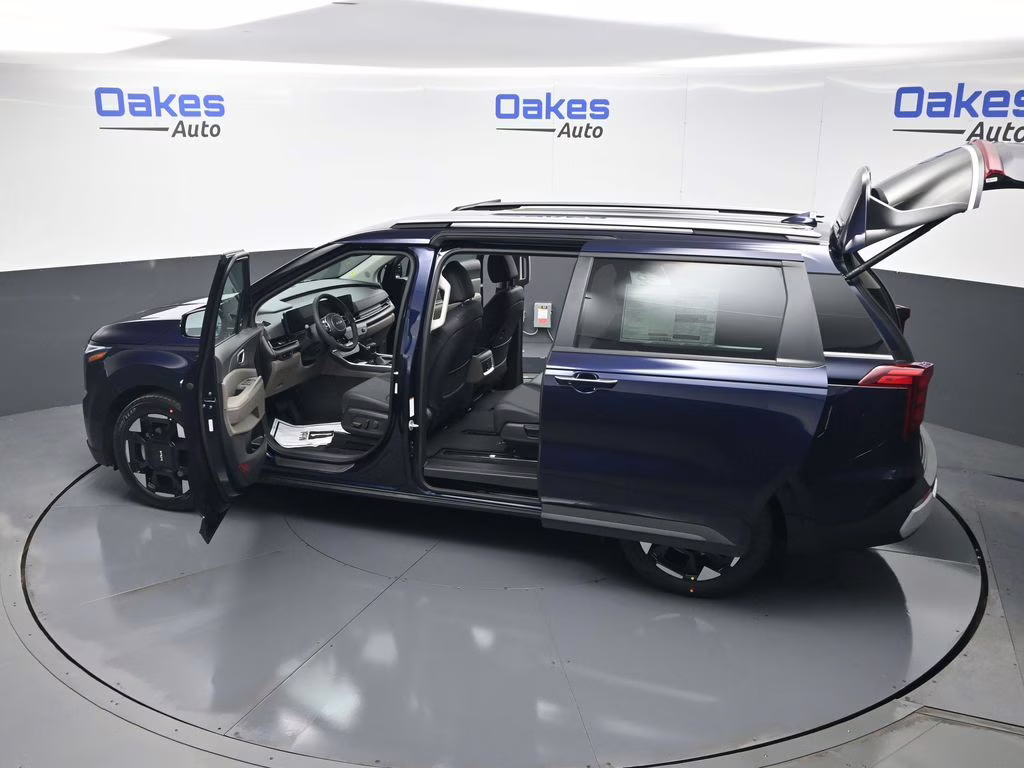 2026 Deep Chroma Blue Kia Carnival EX FWD Van