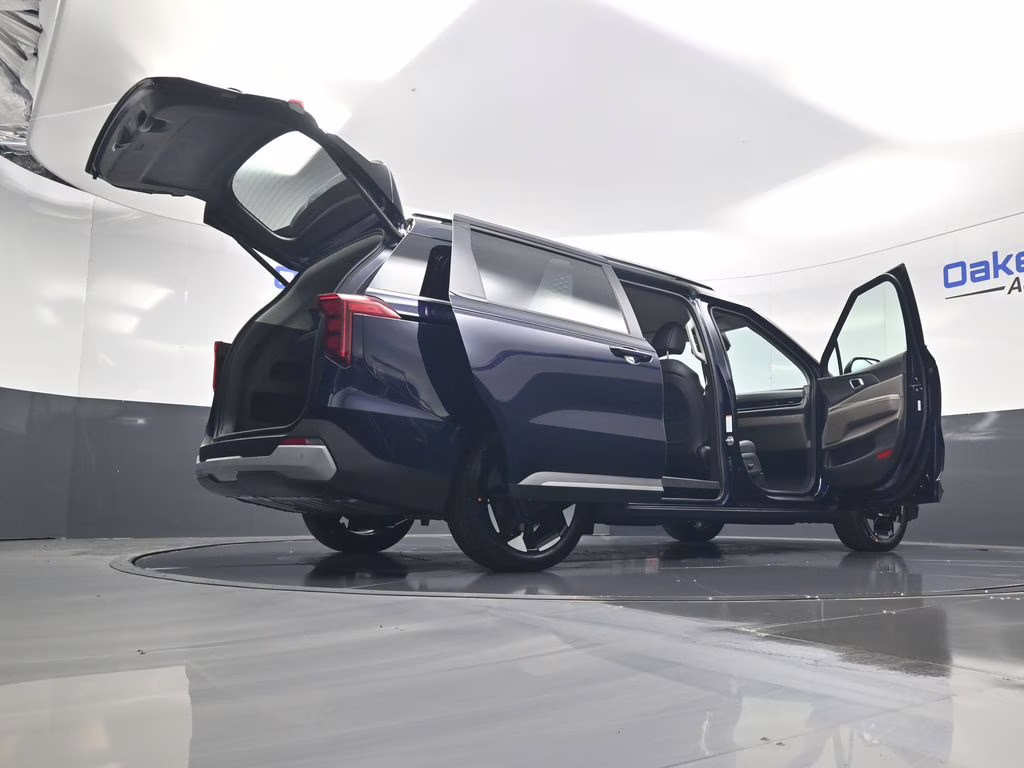 2026 Deep Chroma Blue Kia Carnival EX FWD Van
