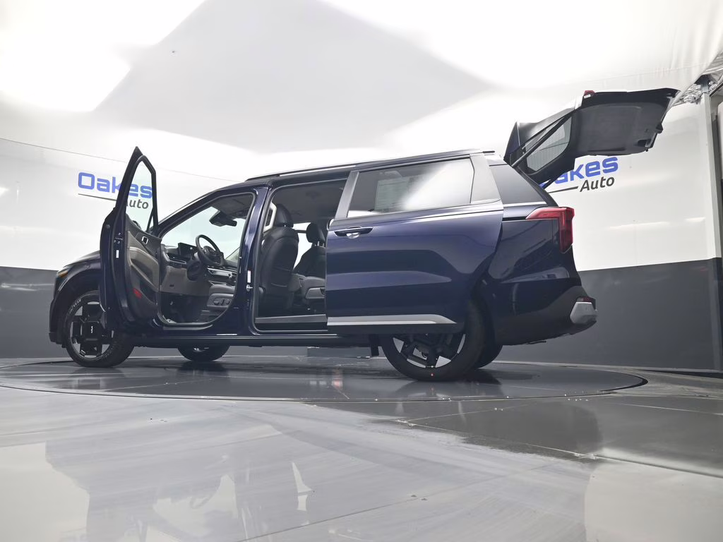 2026 Deep Chroma Blue Kia Carnival EX FWD Van