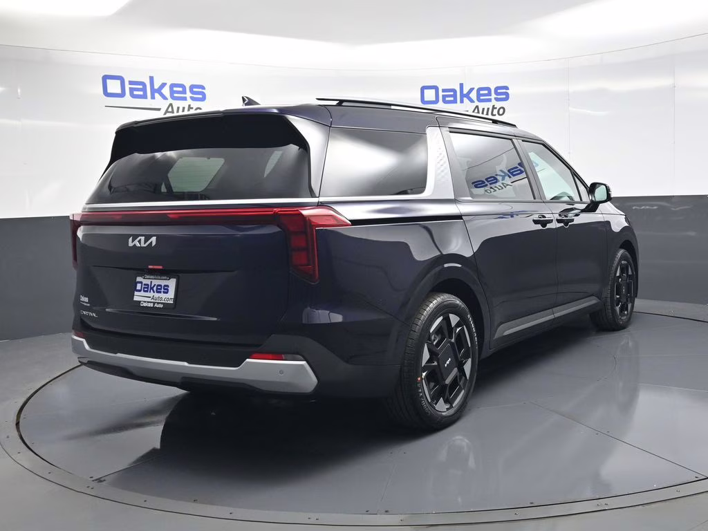 2026 Deep Chroma Blue Kia Carnival EX FWD Van