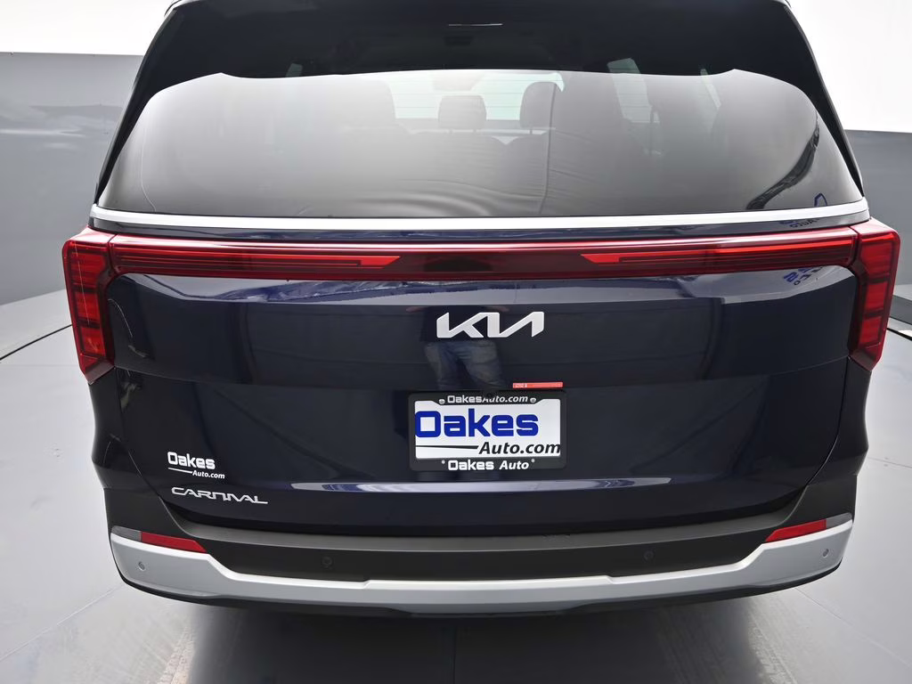 2026 Deep Chroma Blue Kia Carnival EX FWD Van