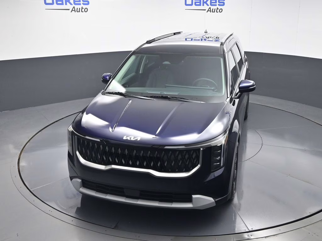 2026 Deep Chroma Blue Kia Carnival EX FWD Van