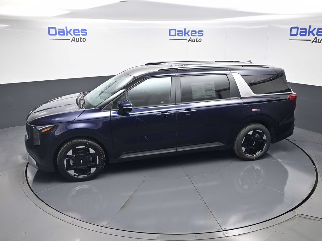 2026 Deep Chroma Blue Kia Carnival EX FWD Van