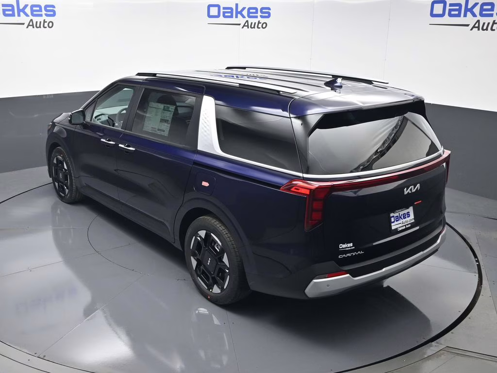 2026 Deep Chroma Blue Kia Carnival EX FWD Van