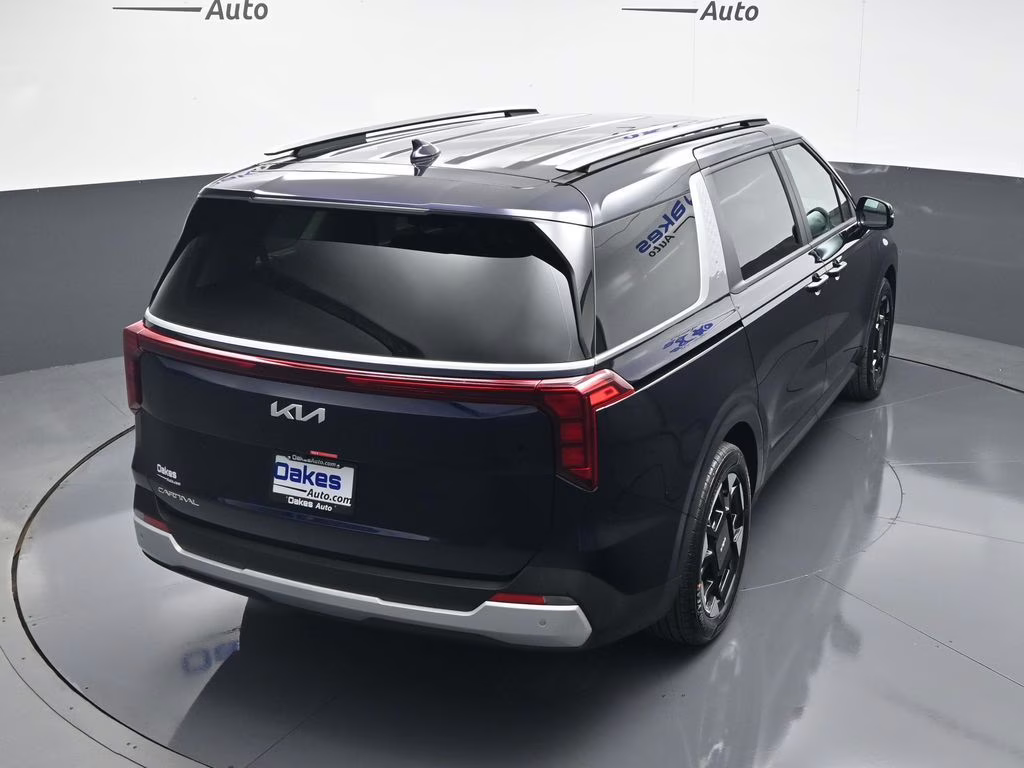 2026 Deep Chroma Blue Kia Carnival EX FWD Van