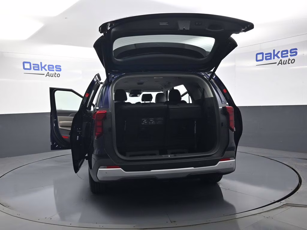 2026 Deep Chroma Blue Kia Carnival EX FWD Van