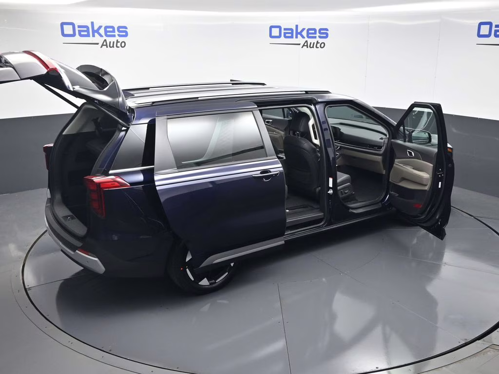 2026 Deep Chroma Blue Kia Carnival EX FWD Van