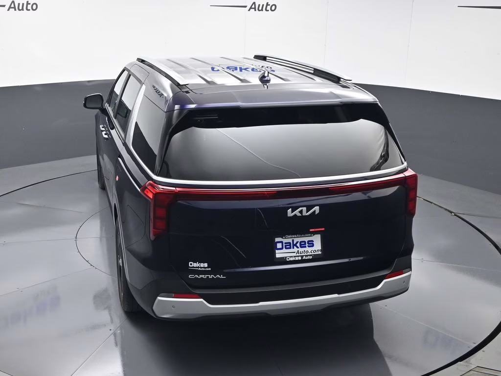 2026 Deep Chroma Blue Kia Carnival EX FWD Van