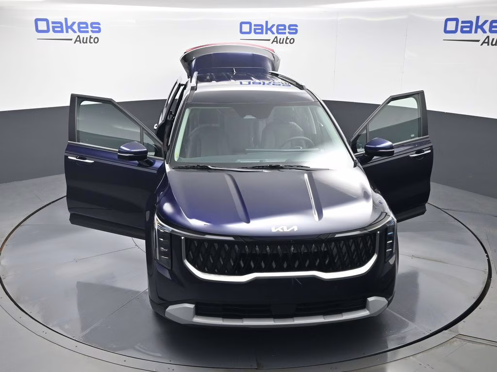 2026 Deep Chroma Blue Kia Carnival EX FWD Van