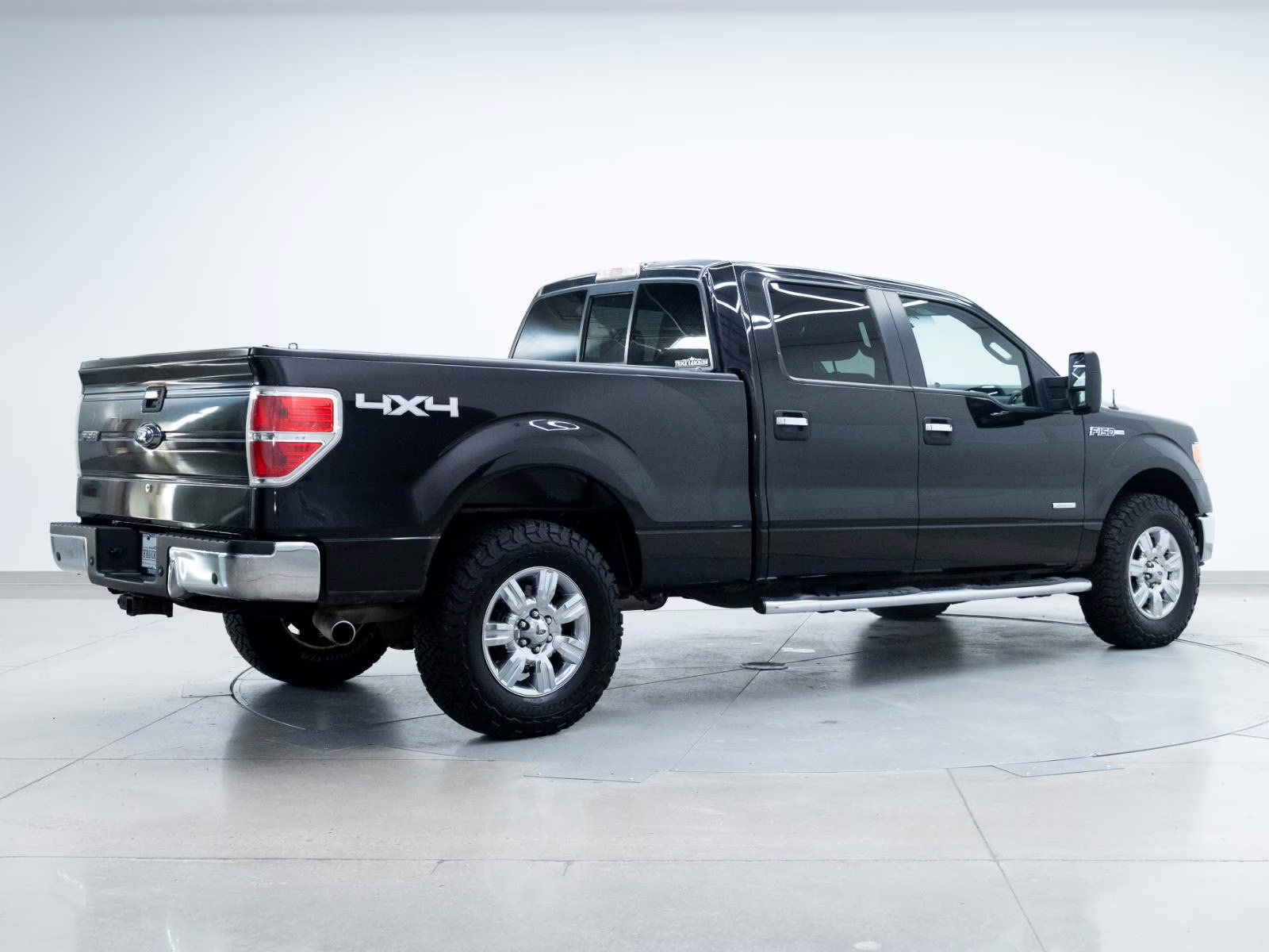 2012 Tuxedo Black Metallic Ford F-150 XLT 4X4 Truck