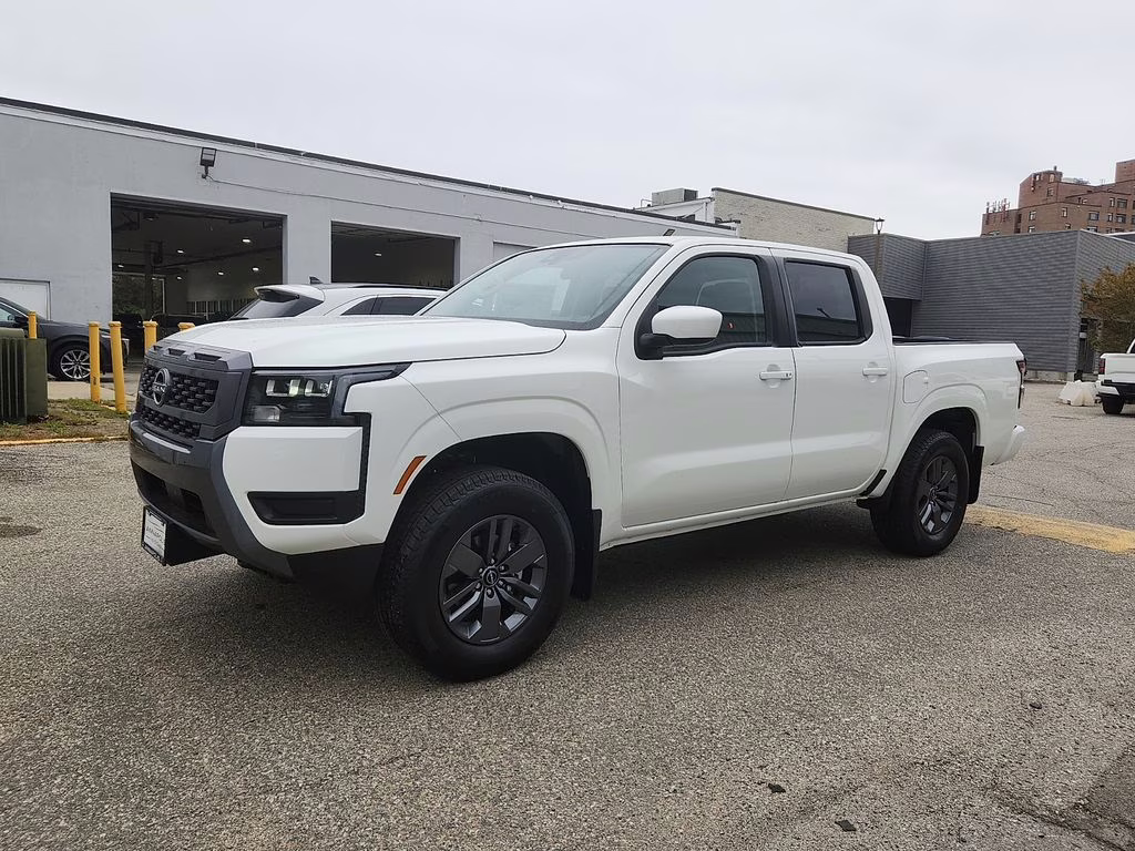 2026 Glacier White Nissan Frontier SV 4X4 Truck