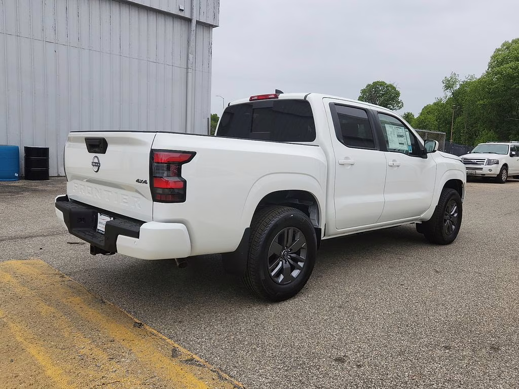 2026 Glacier White Nissan Frontier SV 4X4 Truck