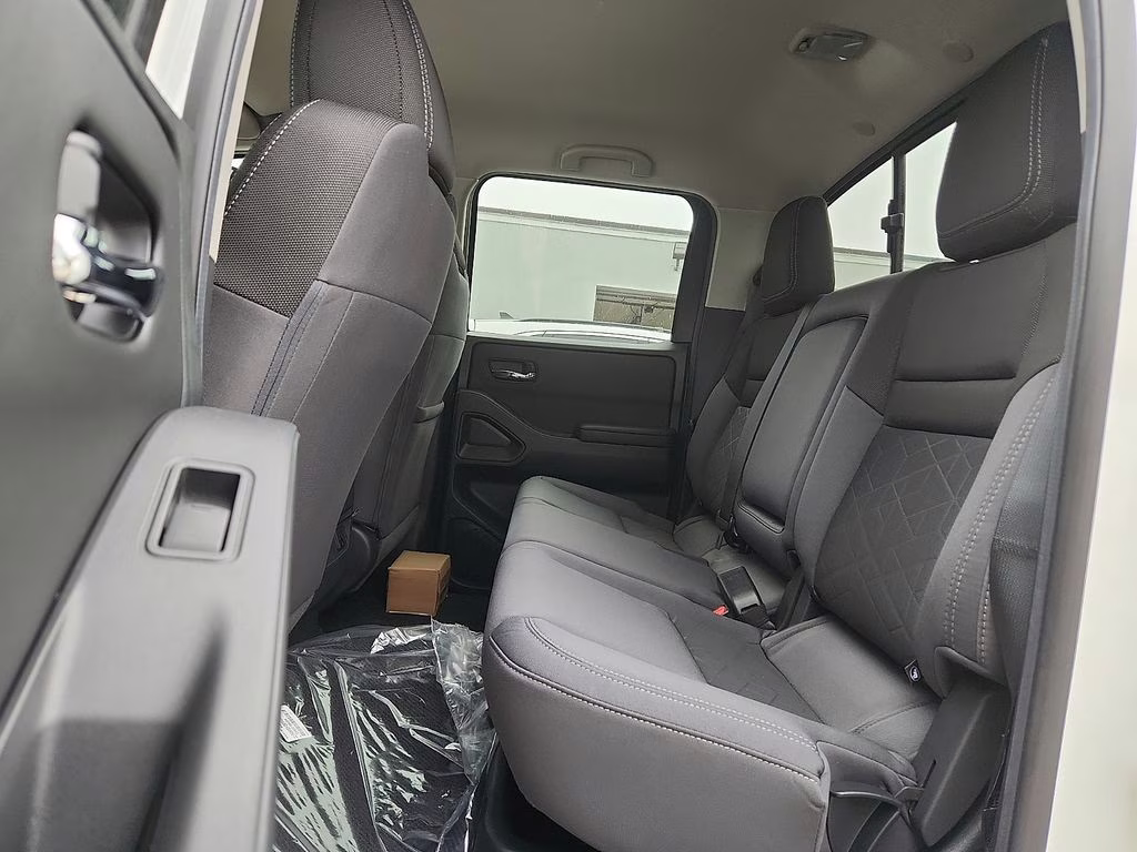2026 Glacier White Nissan Frontier SV 4X4 Truck