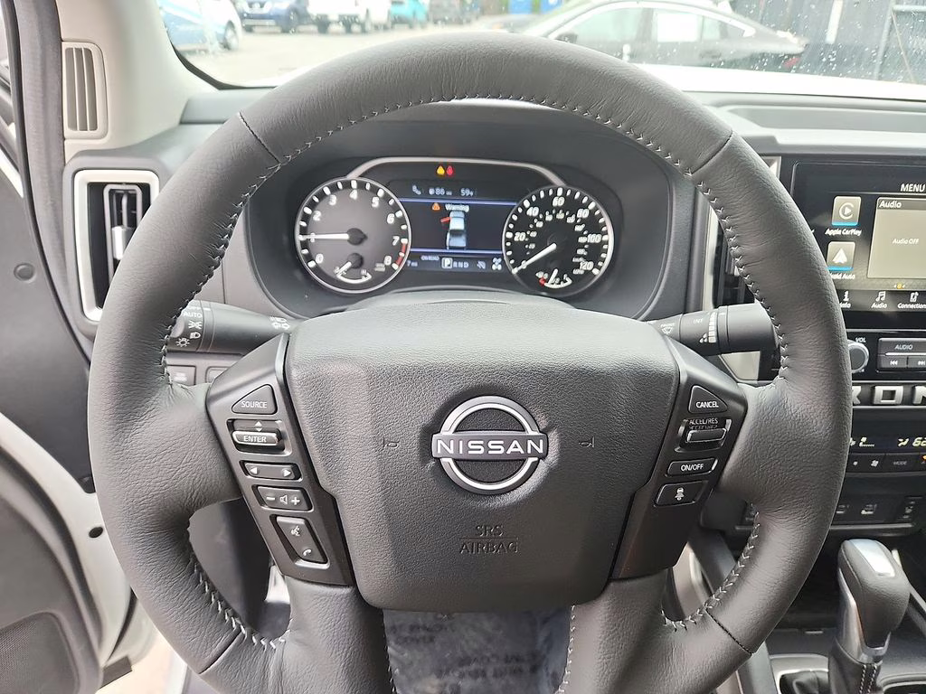2026 Glacier White Nissan Frontier SV 4X4 Truck