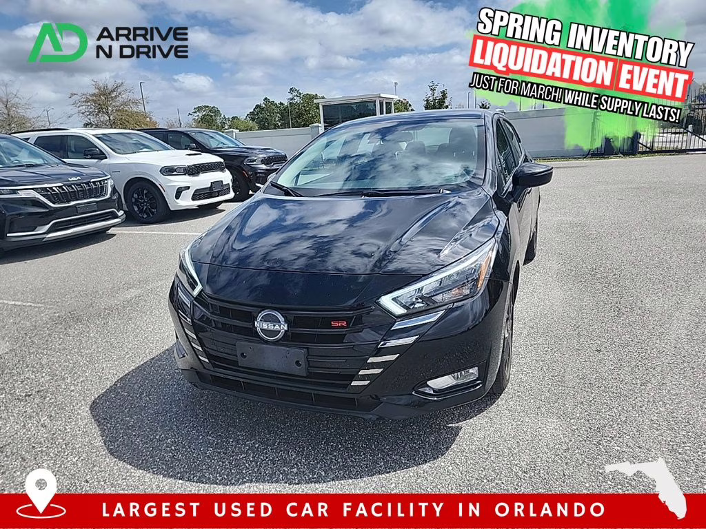 2024 Super Black Nissan Versa 1.6 SR FWD Sedan
