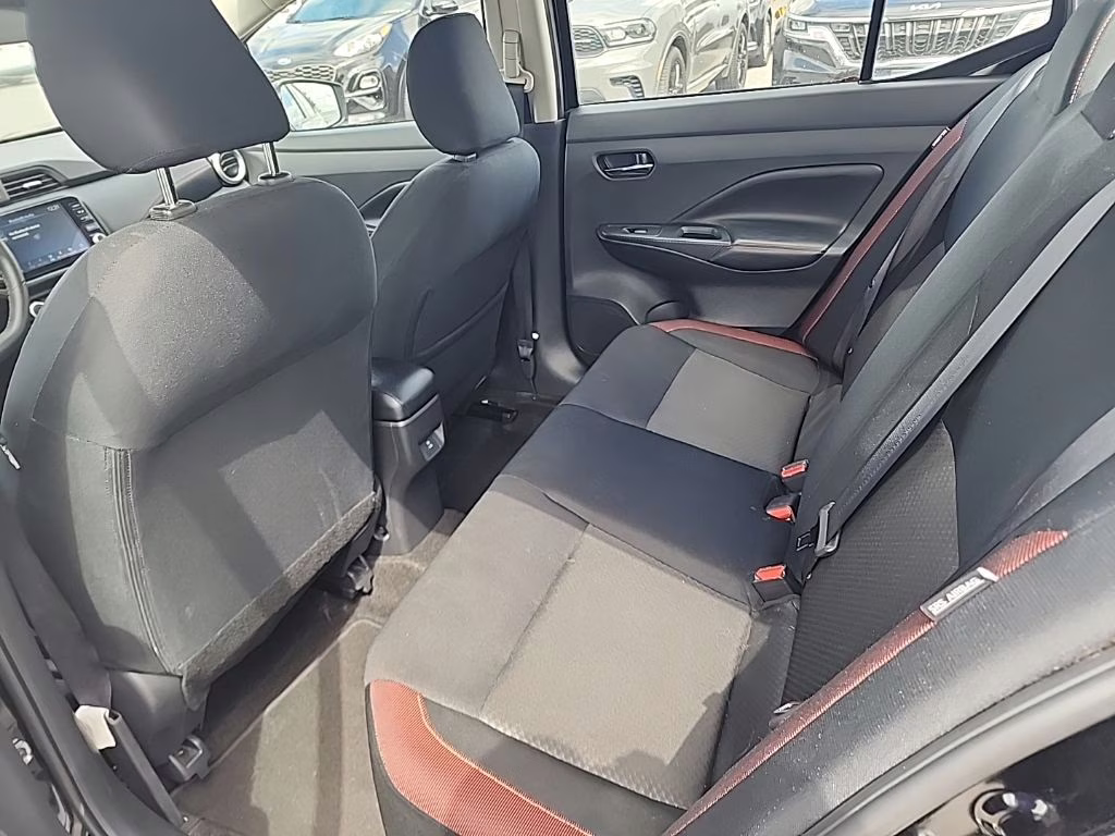 2024 Super Black Nissan Versa 1.6 SR FWD Sedan