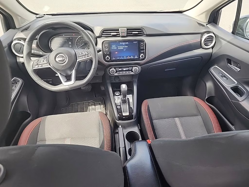 2024 Super Black Nissan Versa 1.6 SR FWD Sedan