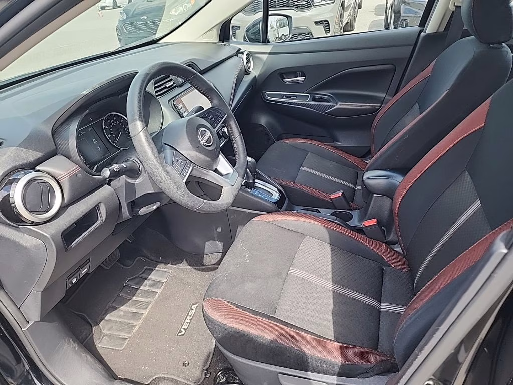 2024 Super Black Nissan Versa 1.6 SR FWD Sedan