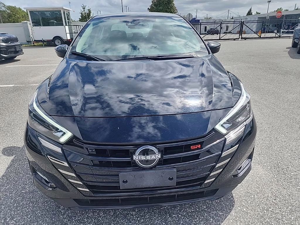 2024 Super Black Nissan Versa 1.6 SR FWD Sedan