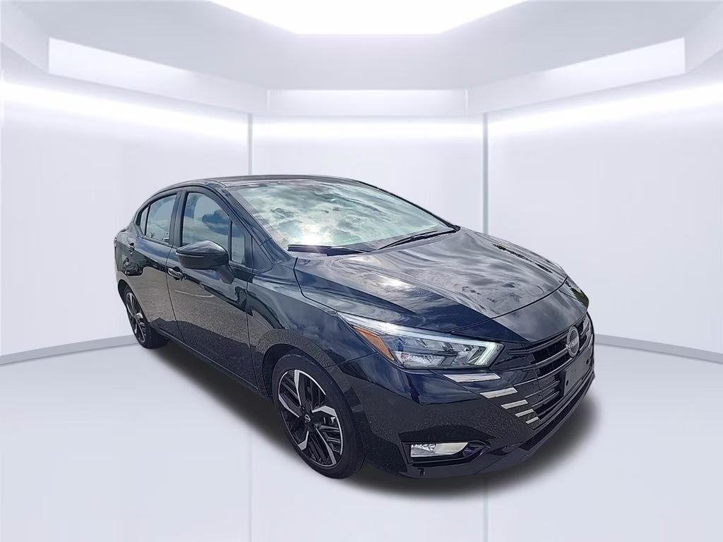 2024 Super Black Nissan Versa 1.6 SR FWD Sedan