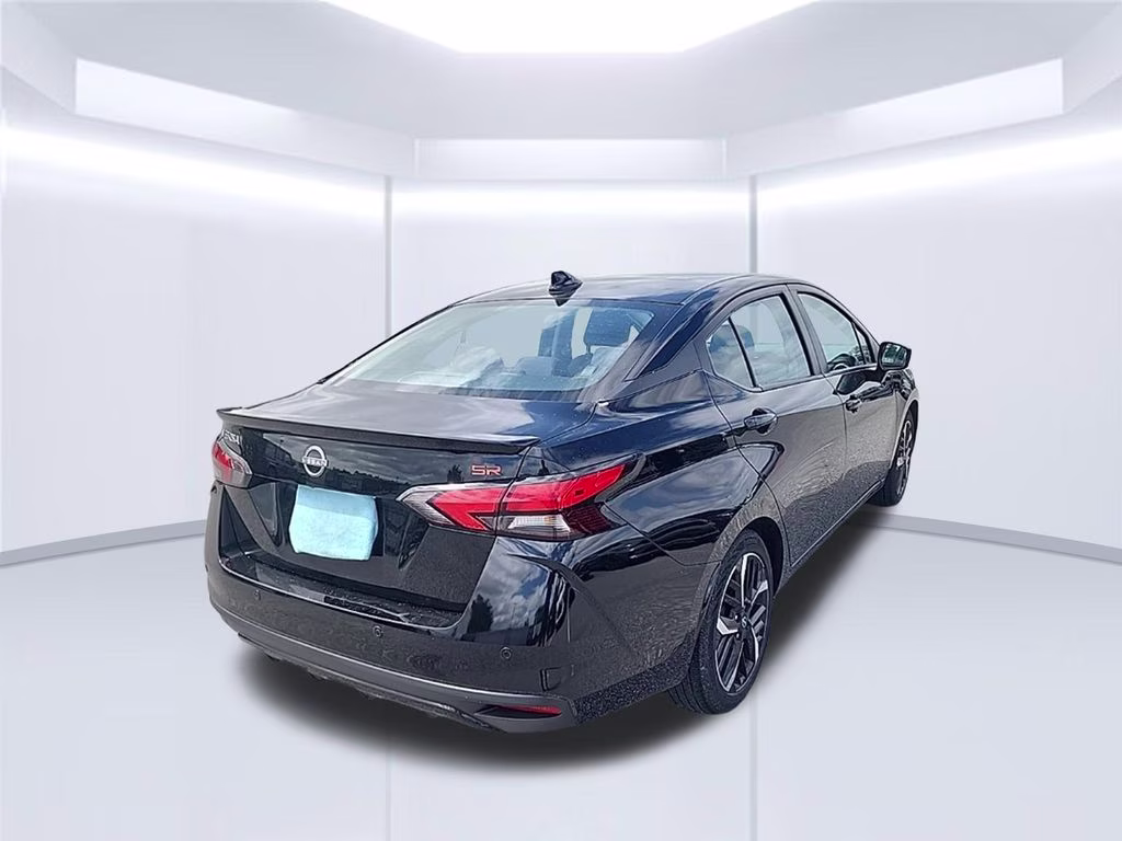 2024 Super Black Nissan Versa 1.6 SR FWD Sedan