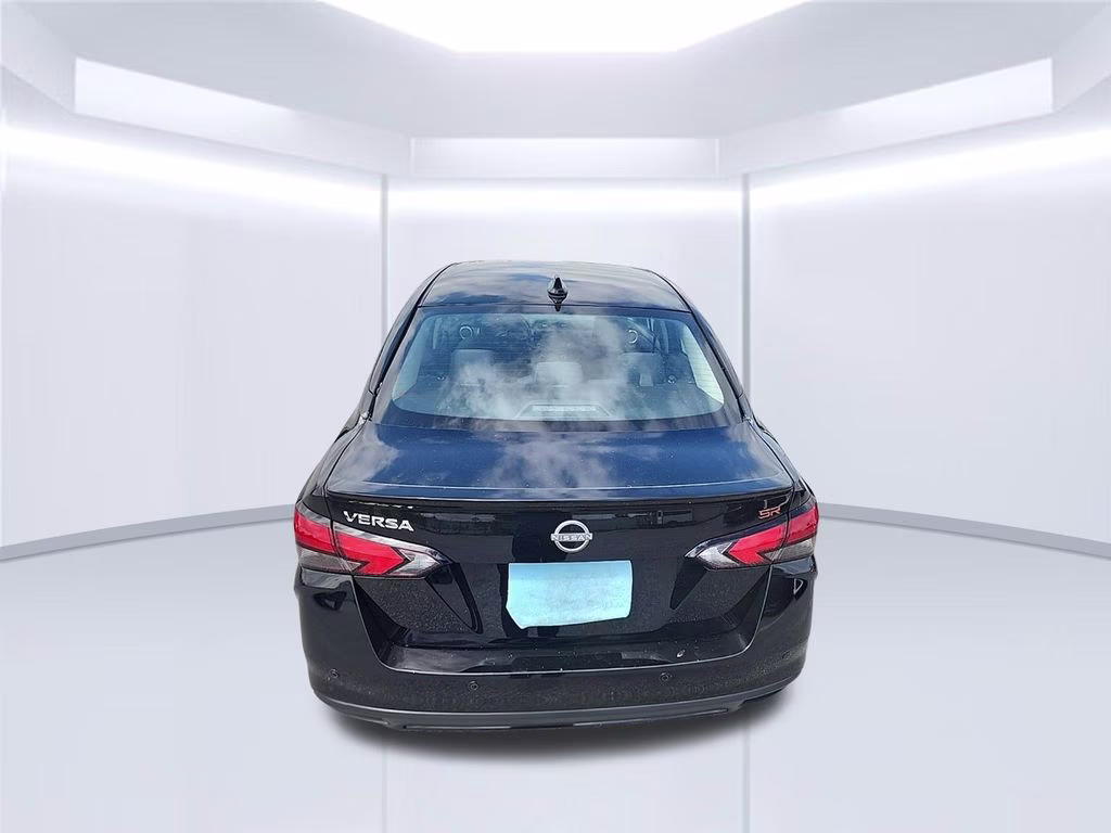 2024 Super Black Nissan Versa 1.6 SR FWD Sedan