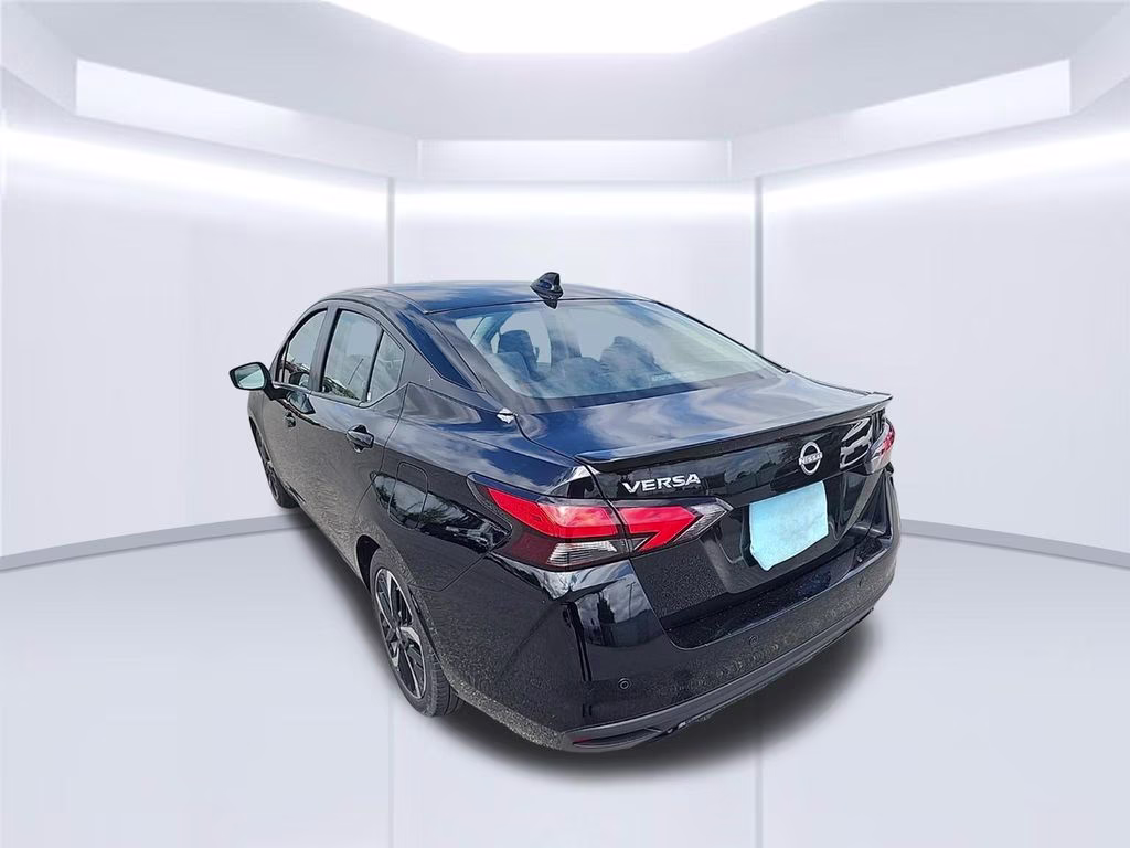 2024 Super Black Nissan Versa 1.6 SR FWD Sedan