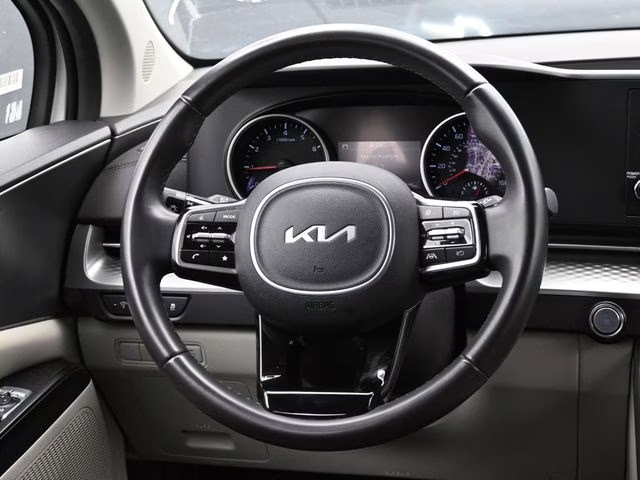 2024 Snow White Pearl Kia Carnival LX FWD Van