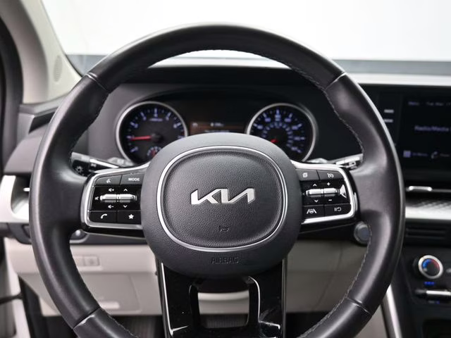 2024 Snow White Pearl Kia Carnival LX FWD Van