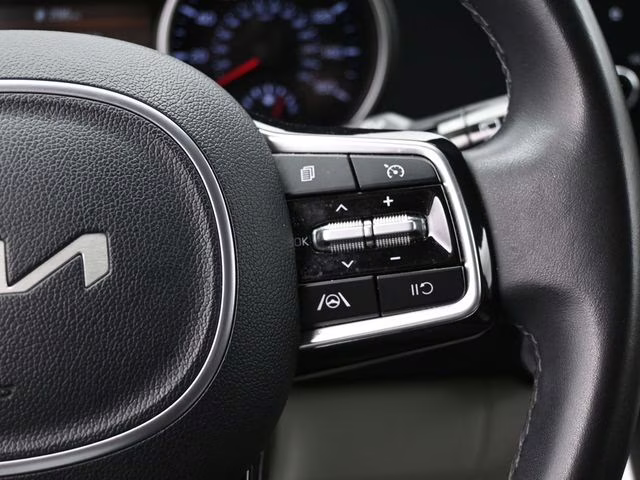 2024 Snow White Pearl Kia Carnival LX FWD Van