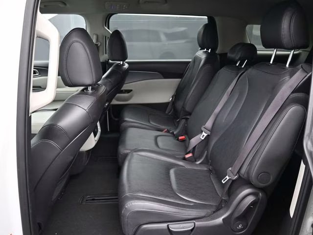 2024 Snow White Pearl Kia Carnival LX FWD Van