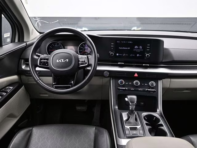 2024 Snow White Pearl Kia Carnival LX FWD Van