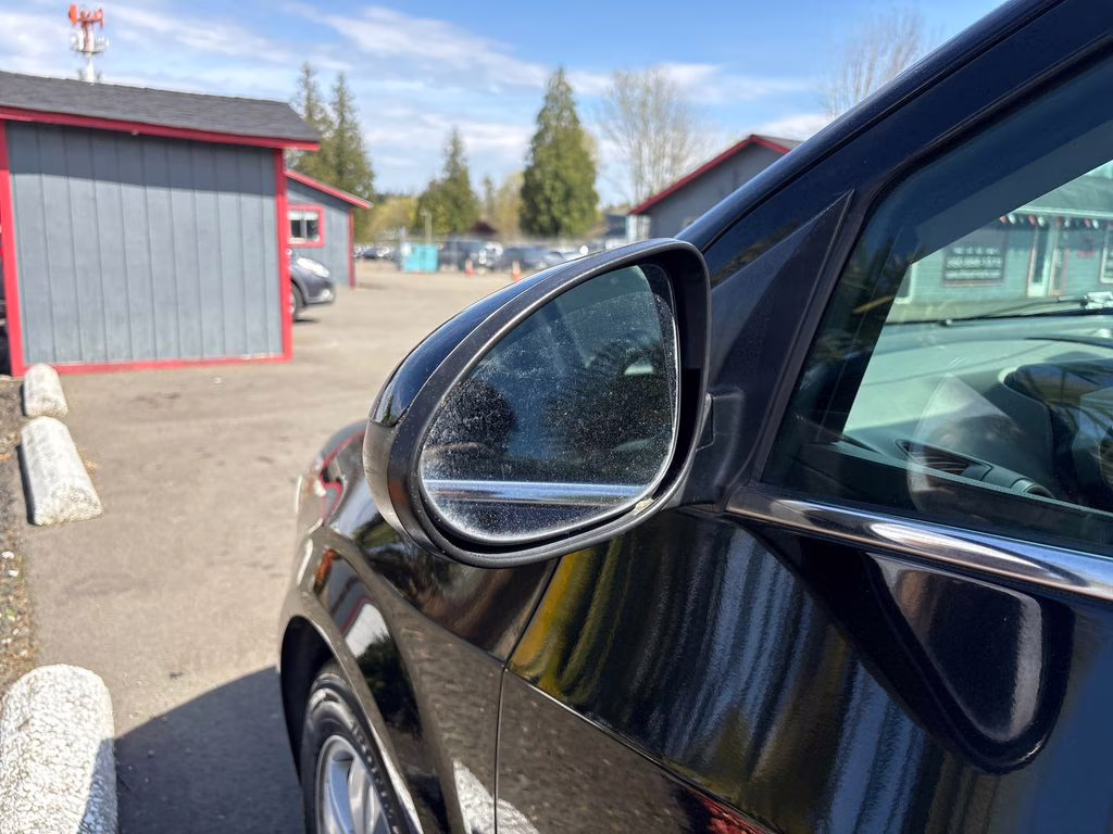 2016 Mosaic Black Metallic Chevrolet Sonic LT FWD Sedan