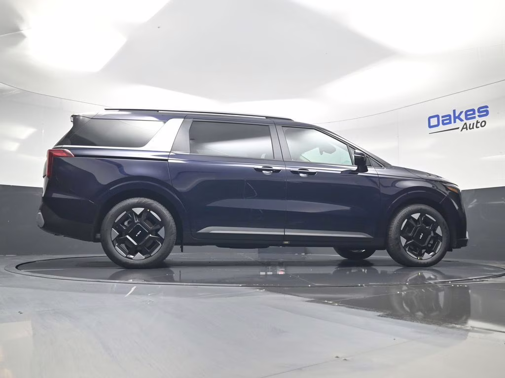 2026 Deep Chroma Blue Kia Carnival EX FWD Van