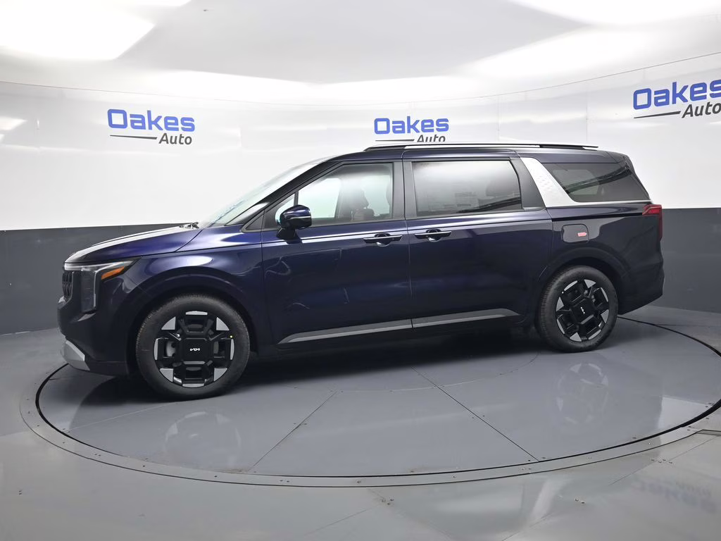2026 Deep Chroma Blue Kia Carnival EX FWD Van