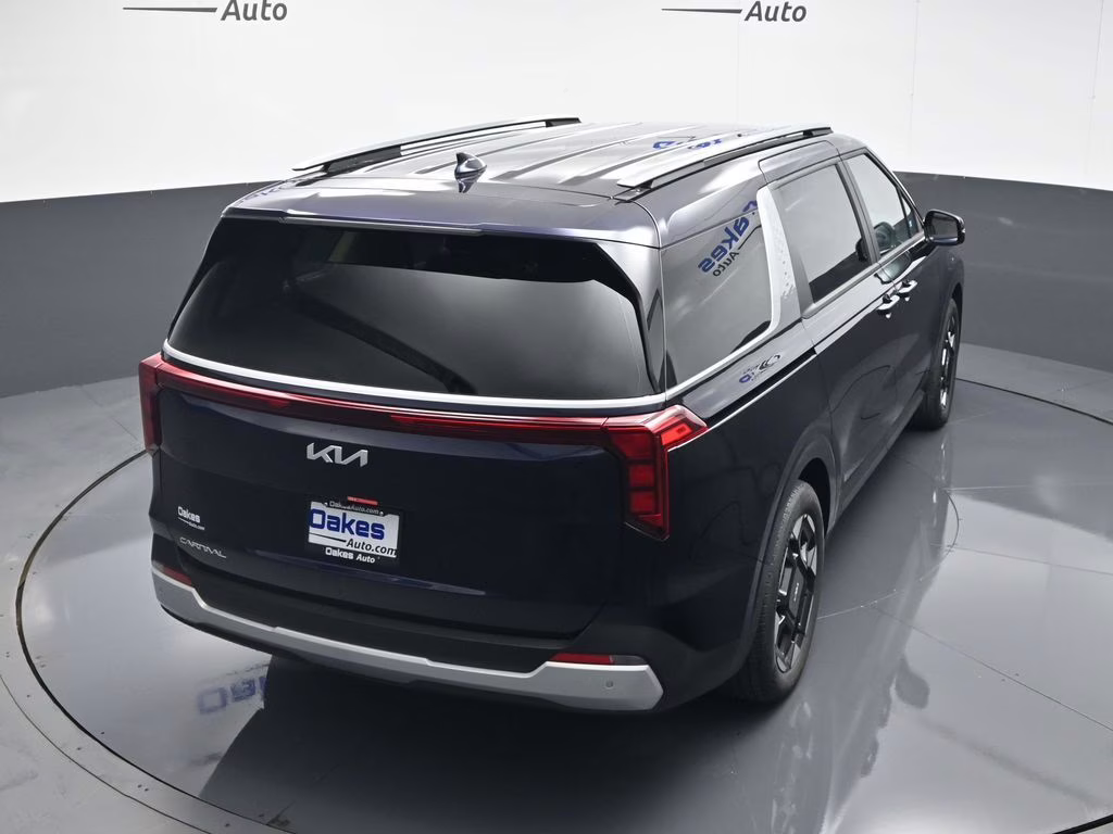 2026 Deep Chroma Blue Kia Carnival EX FWD Van