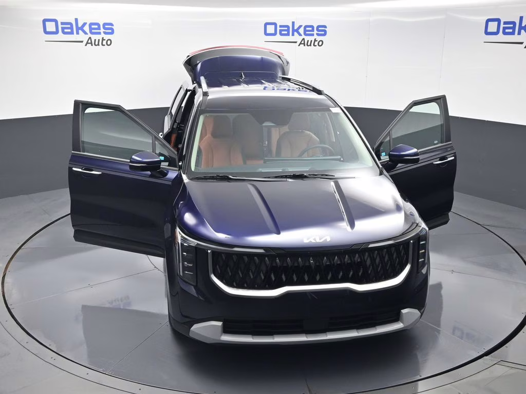 2026 Deep Chroma Blue Kia Carnival EX FWD Van